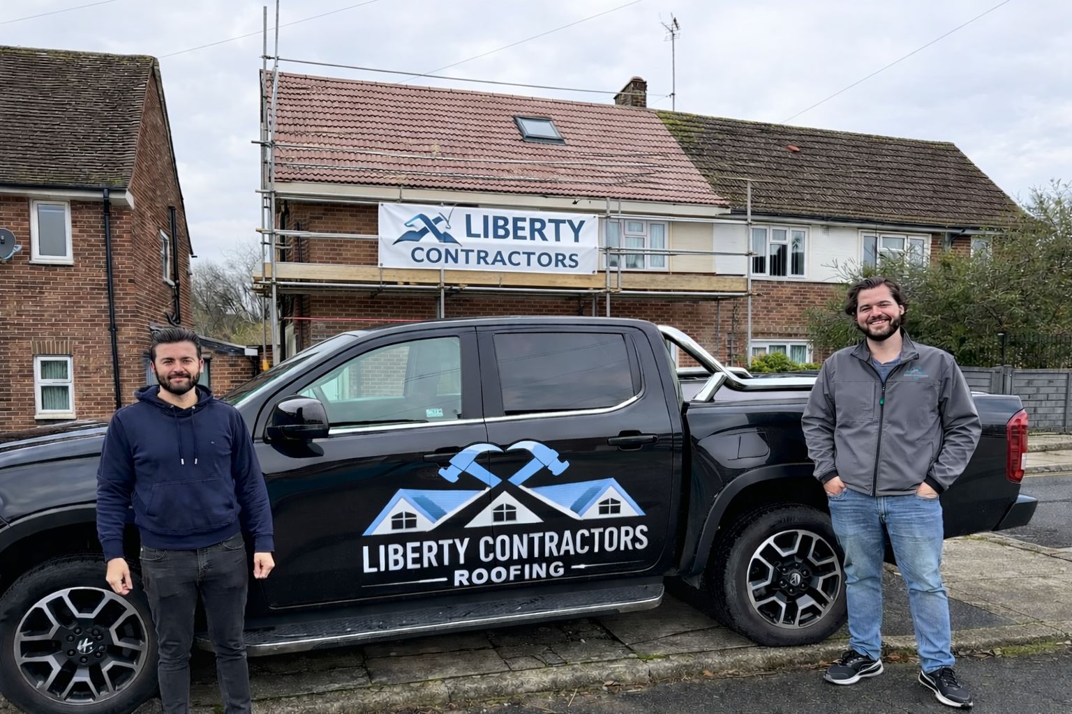 Liberty Contractors Roofing team with their branded pickup truck